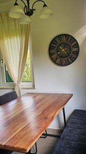 Posezení v ubytování Ferienhaus - Hoamathaus + 13 fotografií