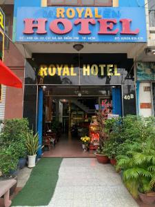 a royal hotel with a sign on the front of it at royal hotel bà điểm hồ chi minh in Ho Chi Minh City