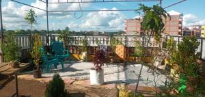 a balcony with a view of a city at Royal properties thika jomoko in Thika