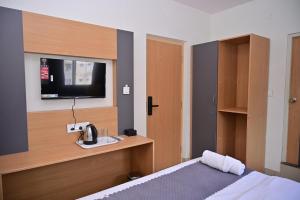 TV a/nebo společenská místnost v ubytování A R Signature Inn