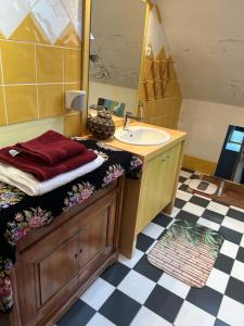 a bathroom with a sink and a mirror at Villa grain de sel in Étaples +32 photos
