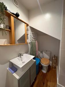 a bathroom with a sink and a toilet at Inglesinhas in Lisbon +24 photos