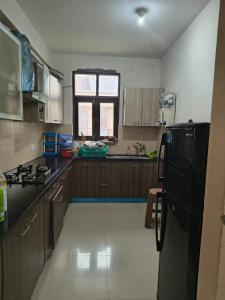 Una cocina o cocineta en Omaxe Cassia