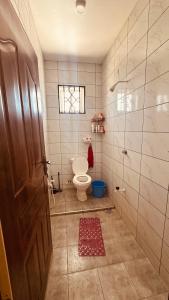 Koupelna v ubytování Nyota House