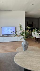 TV a/nebo společenská místnost v ubytování Al Marsa