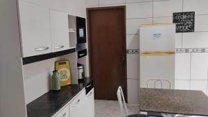 Køkken eller tekøkken på Recanto da Helo