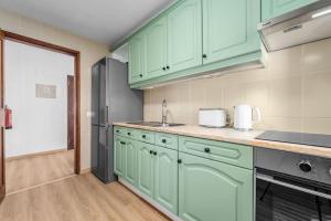 Køkken eller tekøkken på Orion's Retreat Garajau, Caniço