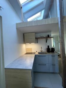 Una cocina o cocineta en Guesthouse at Roland's