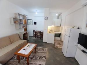 Kuchyň nebo kuchyňský kout v ubytování Aila Apartament