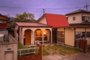 a house with a red roof at 甲府木ノ間Kofu Konoma in Kofu