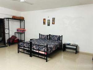 Postel nebo postele na pokoji v ubytování Raj 3bhk Villa Calangute