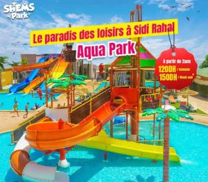 ein Poster eines Wasserparks mit Rutsche in der Unterkunft Blue Ocean Escape Sidi Rhal in Sidi Rahal