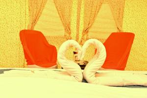 Postel nebo postele na pokoji v ubytování Yash Desert Resort