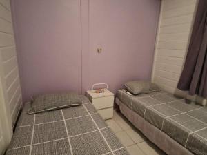 Ένα ή περισσότερα κρεβάτια σε δωμάτιο στο L'Océane, grande piscine, vue mer et baie panoramique - T3 +26 φωτογραφίες