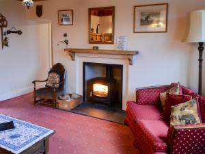 Khu vực ghế ngồi tại Culcharry Cottage