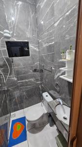 Salle de bains dans l'établissement Furnished studio apartment