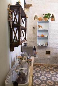 a kitchen with a counter with at Costa Bed and Breakfast in Pollutri