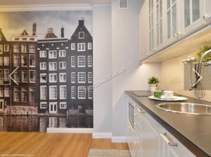 a kitchen with a wall mural of a city at EUROPA22 Apartament RELAKS z JACUZZI w samym sercu miasta Prestiżowe osiedle z widokiem na park i staw z fontannami Szybkie i Łatwe Zameldowanie in Tomaszów Mazowiecki