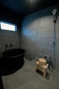 a bathroom with a bath tub and a toilet at Asago - House - Vacation STAY 43959v in Takeda