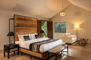 Postel nebo postele na pokoji v ubytování Aranya Trails Wilpattu