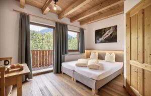 Postel nebo postele na pokoji v ubytování AREA 47 - Tirol