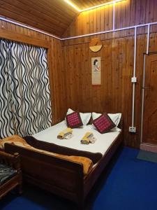 Voodi või voodid majutusasutuse Hotel PP toas