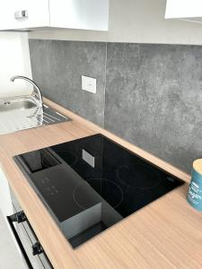 a kitchen with a sink and a counter top at Casa Vacanze da Marco & Carmela in Perugia