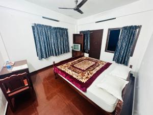 Ένα ή περισσότερα κρεβάτια σε δωμάτιο στο Sky Blue