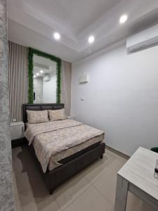 Postel nebo postele na pokoji v ubytování Apartman Kruna