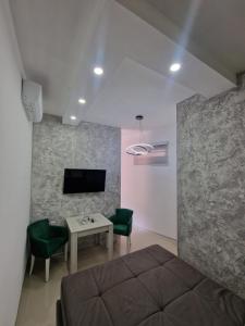TV a/nebo společenská místnost v ubytování Apartman Kruna