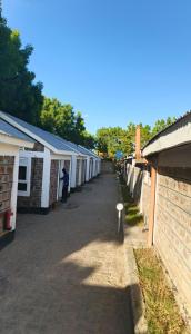 a row of buildings in a row at Sandfields Lodwar Resort and Spa in Lodwar