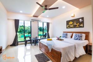 Postel nebo postele na pokoji v ubytování Hill Resort