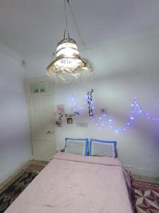 Postel nebo postele na pokoji v ubytování chambre au centre de tunis