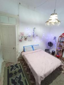 Postel nebo postele na pokoji v ubytování chambre au centre de tunis
