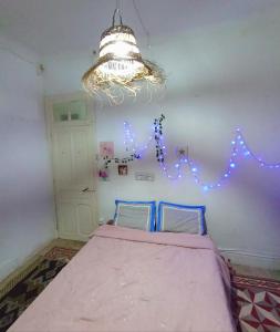 Postel nebo postele na pokoji v ubytování chambre au centre de tunis