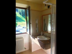A bathroom at R.T.A. Hotel Monte Rosa Még 37 kép