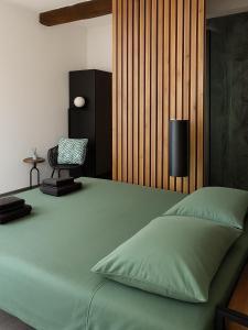 Ένα ή περισσότερα κρεβάτια σε δωμάτιο στο Suite Sole & Boutique Rooms
