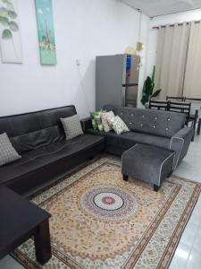 Χώρος καθιστικού στο Homestay Casa Mutiara