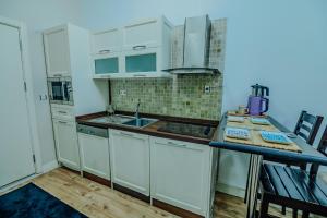 Kuchyň nebo kuchyňský kout v ubytování Taksim inci Apartment