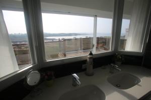 Koupelna v ubytování Malibu OceanView Homestay + 37 fotografií