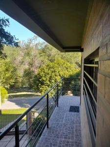 a view from a balcony of a building at Depto deluxe frente al río in San Antonio de Arredondo