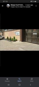 a screenshot of a picture of a building with a street at Mango Court in Nairobi +3 photos