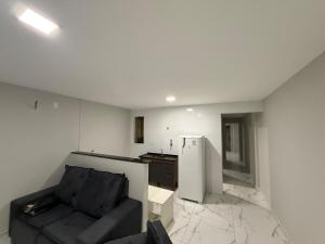 Kuchyň nebo kuchyňský kout v ubytování Duque de Caxias Apart Hotel