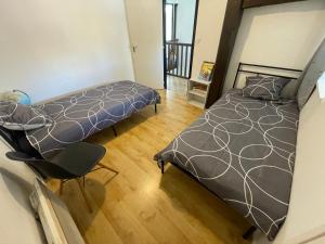 Ένα ή περισσότερα κρεβάτια σε δωμάτιο στο Duplex T4 centre historique