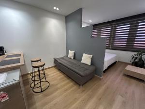 En eller flere senge i et værelse på Elegante lugar a pasos del metro + 14 billeder