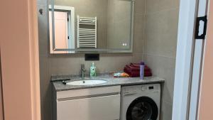 Koupelna v ubytování Apartment in centrul orasului + 25 fotografií