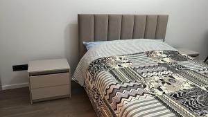 Postel nebo postele na pokoji v ubytování Apartment in centrul orasului