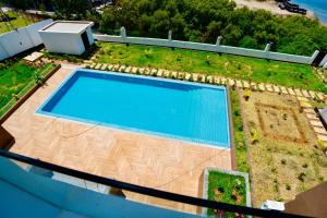 Bazén v ubytování Tanga City Apartments nebo v jeho okolí