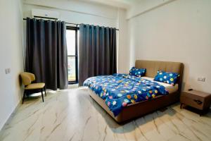 Postel nebo postele na pokoji v ubytování Tanga City Apartments + 13 fotografií