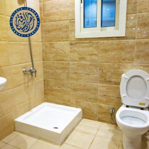 Koupelna v ubytování فندق تارا المحبس -محبس الجن-